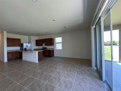 Enjoy Corner-Unit Townhouse with Golf Course Views -Davenport on Ridgewood Lakes Golf and Country Club in Florida - for sale on GolfHomes.com, golf home, golf lot