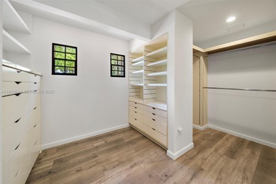 Rare mediterranean estate exuding sophistication and beach vibes on Miami Beach Golf Club in Florida - for sale on GolfHomes.com, golf home, golf lot