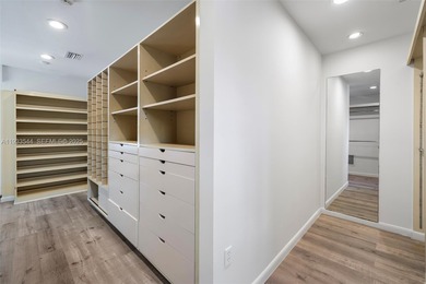 Rare mediterranean estate exuding sophistication and beach vibes on Miami Beach Golf Club in Florida - for sale on GolfHomes.com, golf home, golf lot