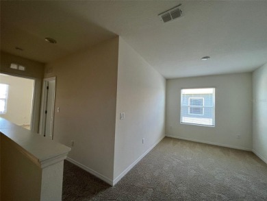Enjoy Corner-Unit Townhouse with Golf Course Views -Davenport on Ridgewood Lakes Golf and Country Club in Florida - for sale on GolfHomes.com, golf home, golf lot