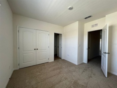 Enjoy Corner-Unit Townhouse with Golf Course Views -Davenport on Ridgewood Lakes Golf and Country Club in Florida - for sale on GolfHomes.com, golf home, golf lot