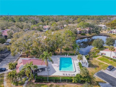 Under contract-accepting backup offers. Welcome to this inviting on Tarpon Woods Golf Club in Florida - for sale on GolfHomes.com, golf home, golf lot