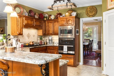 Luxurious golf community living on the third hole of Timber on The Plantation Golf Club in Mississippi - for sale on GolfHomes.com, golf home, golf lot