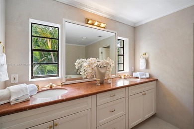 Rare mediterranean estate exuding sophistication and beach vibes on Miami Beach Golf Club in Florida - for sale on GolfHomes.com, golf home, golf lot