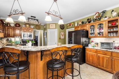 Luxurious golf community living on the third hole of Timber on The Plantation Golf Club in Mississippi - for sale on GolfHomes.com, golf home, golf lot