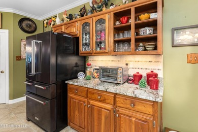 Luxurious golf community living on the third hole of Timber on The Plantation Golf Club in Mississippi - for sale on GolfHomes.com, golf home, golf lot