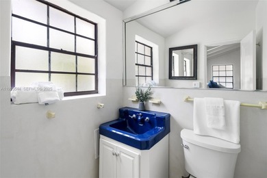 Rare mediterranean estate exuding sophistication and beach vibes on Miami Beach Golf Club in Florida - for sale on GolfHomes.com, golf home, golf lot