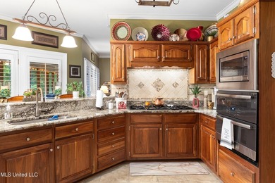 Luxurious golf community living on the third hole of Timber on The Plantation Golf Club in Mississippi - for sale on GolfHomes.com, golf home, golf lot