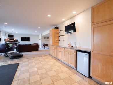 Beautifully updated, custom built home perfectly set within the on WeaverRidge Golf Club in Illinois - for sale on GolfHomes.com, golf home, golf lot