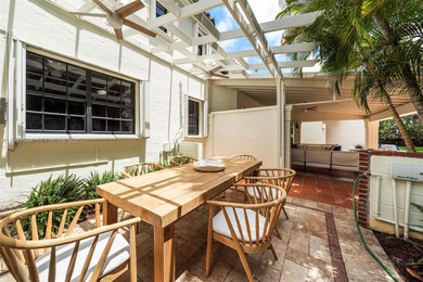 Rare mediterranean estate exuding sophistication and beach vibes on Miami Beach Golf Club in Florida - for sale on GolfHomes.com, golf home, golf lot