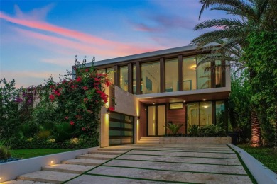 Modern luxurious home overlooking a beautiful Golf Course. This on Miami Beach Golf Club in Florida - for sale on GolfHomes.com, golf home, golf lot