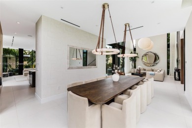Modern luxurious home overlooking a beautiful Golf Course. This on Miami Beach Golf Club in Florida - for sale on GolfHomes.com, golf home, golf lot