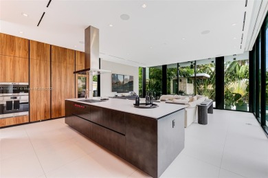 Modern luxurious home overlooking a beautiful Golf Course. This on Miami Beach Golf Club in Florida - for sale on GolfHomes.com, golf home, golf lot