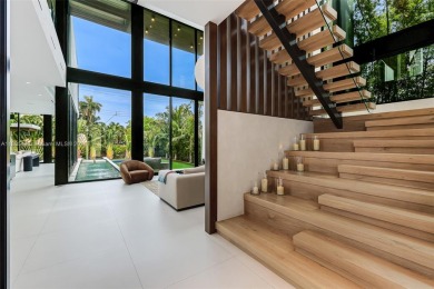 Modern luxurious home overlooking a beautiful Golf Course. This on Miami Beach Golf Club in Florida - for sale on GolfHomes.com, golf home, golf lot