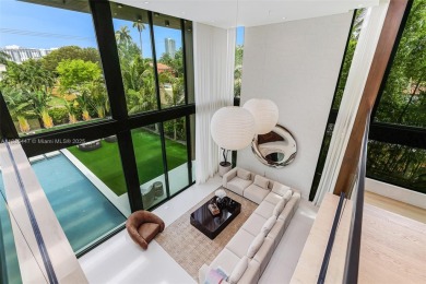 Modern luxurious home overlooking a beautiful Golf Course. This on Miami Beach Golf Club in Florida - for sale on GolfHomes.com, golf home, golf lot