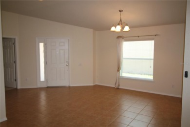 A rare opportunity to own one of only a few homes with the on Ridgewood Lakes Golf and Country Club in Florida - for sale on GolfHomes.com, golf home, golf lot