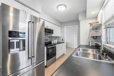 Discover easy Florida living in this updated 3-bed, 2-bath home on Sara Bay Country Club in Florida - for sale on GolfHomes.com, golf home, golf lot