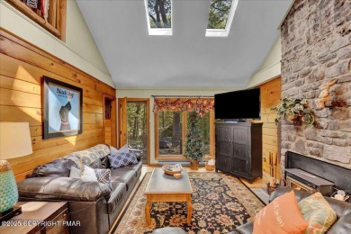 Rustic mountain escape with warm wood features! This 3 bedroom on Split Rock Resort and Country Club in Pennsylvania - for sale on GolfHomes.com, golf home, golf lot