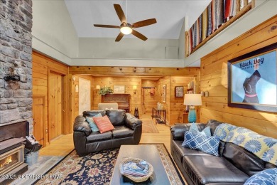 Rustic mountain escape with warm wood features! This 3 bedroom on Split Rock Resort and Country Club in Pennsylvania - for sale on GolfHomes.com, golf home, golf lot