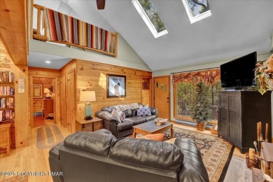 Rustic mountain escape with warm wood features! This 3 bedroom on Split Rock Resort and Country Club in Pennsylvania - for sale on GolfHomes.com, golf home, golf lot
