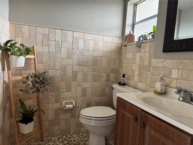 Welcome to your dream condo located in the country club on Pine Island Ridge Country Club in Florida - for sale on GolfHomes.com, golf home, golf lot