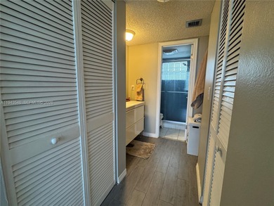 Welcome to your dream condo located in the country club on Pine Island Ridge Country Club in Florida - for sale on GolfHomes.com, golf home, golf lot