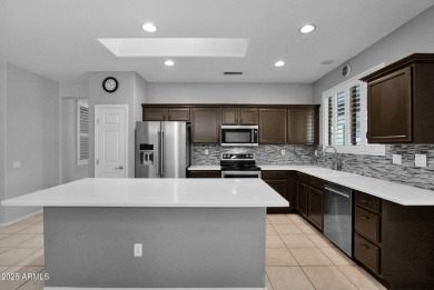 Enjoy resort-style living in this charming 2 bed/2 ba plus den on Desert Springs Golf Course in Arizona - for sale on GolfHomes.com, golf home, golf lot