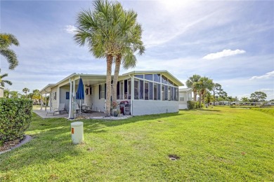 Under contract-accepting backup offers. Three bedroom 2005 Palm on Maple Leaf Golf and Country Club in Florida - for sale on GolfHomes.com, golf home, golf lot