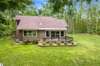 Enjoy a peaceful, wooded retreat. This charming property offers on Black Forest At Wilderness Valley in Michigan - for sale on GolfHomes.com, golf home, golf lot