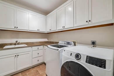 Welcome to 1628 Lost Cove Lane, a beautifully updated 4 bedroom on Sharks Tooth Golf Club in Florida - for sale on GolfHomes.com, golf home, golf lot