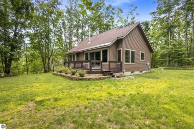 Enjoy a peaceful, wooded retreat. This charming property offers on Black Forest At Wilderness Valley in Michigan - for sale on GolfHomes.com, golf home, golf lot