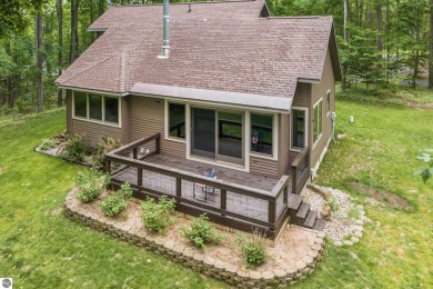 Enjoy a peaceful, wooded retreat. This charming property offers on Black Forest At Wilderness Valley in Michigan - for sale on GolfHomes.com, golf home, golf lot