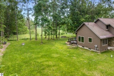 Enjoy a peaceful, wooded retreat. This charming property offers on Black Forest At Wilderness Valley in Michigan - for sale on GolfHomes.com, golf home, golf lot
