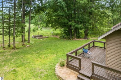Enjoy a peaceful, wooded retreat. This charming property offers on Black Forest At Wilderness Valley in Michigan - for sale on GolfHomes.com, golf home, golf lot