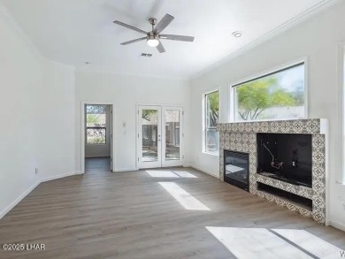 Experience the perfect blend of modern comfort and resort-style on Laughlin Ranch Golf Club in Arizona - for sale on GolfHomes.com, golf home, golf lot