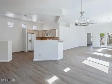 Experience the perfect blend of modern comfort and resort-style on Laughlin Ranch Golf Club in Arizona - for sale on GolfHomes.com, golf home, golf lot