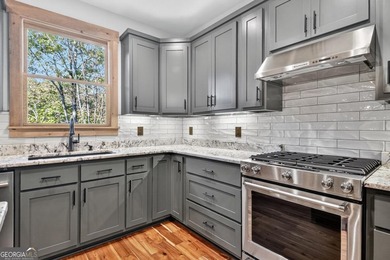 Overlooking a serene hidden lake-known by some residents as on White Path Golf Club in Georgia - for sale on GolfHomes.com, golf home, golf lot