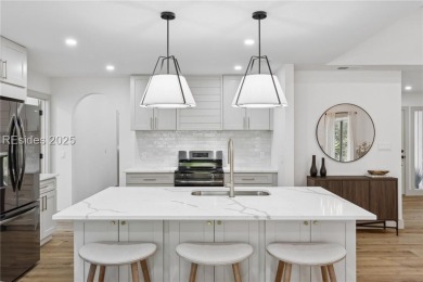 Exquisitely reimagined, this three bedroom, three and a half on Bear Creek Golf Course and Club in South Carolina - for sale on GolfHomes.com, golf home, golf lot