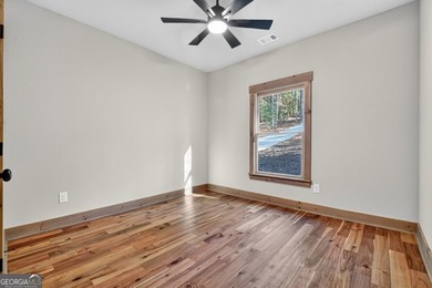 Overlooking a serene hidden lake-known by some residents as on White Path Golf Club in Georgia - for sale on GolfHomes.com, golf home, golf lot