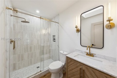 Exquisitely reimagined, this three bedroom, three and a half on Bear Creek Golf Course and Club in South Carolina - for sale on GolfHomes.com, golf home, golf lot