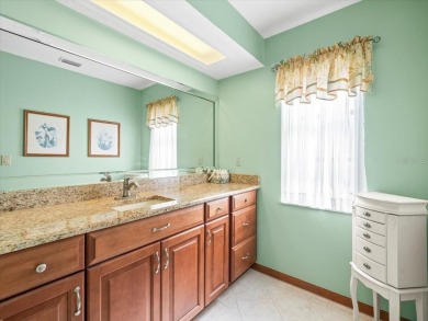 This 1990 Alexander Boca Grande Deluxe pool home is located on on Glen Lakes Country Club in Florida - for sale on GolfHomes.com, golf home, golf lot
