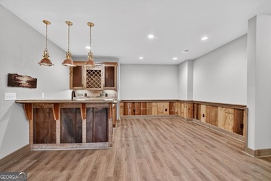 Overlooking a serene hidden lake-known by some residents as on White Path Golf Club in Georgia - for sale on GolfHomes.com, golf home, golf lot