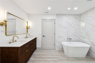 Exquisitely reimagined, this three bedroom, three and a half on Bear Creek Golf Course and Club in South Carolina - for sale on GolfHomes.com, golf home, golf lot