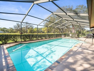 This 1990 Alexander Boca Grande Deluxe pool home is located on on Glen Lakes Country Club in Florida - for sale on GolfHomes.com, golf home, golf lot