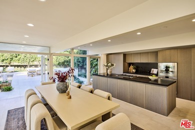 Tucked behind the guarded gates of the exclusive Malibu Colony on Calabasas Golf and Country Club in California - for sale on GolfHomes.com, golf home, golf lot