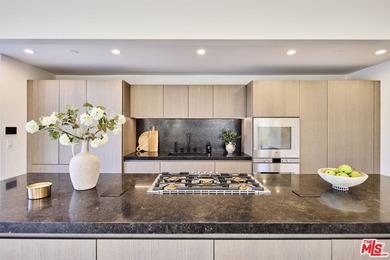 Tucked behind the guarded gates of the exclusive Malibu Colony on Calabasas Golf and Country Club in California - for sale on GolfHomes.com, golf home, golf lot