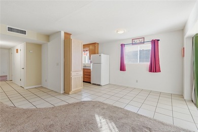 Charming 3-bedroom, 2-bath home offering 1,393 sq ft of on Cerbat Cliffs Golf Course in Arizona - for sale on GolfHomes.com, golf home, golf lot