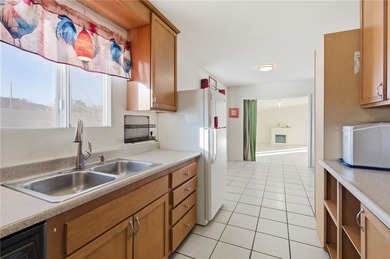 Charming 3-bedroom, 2-bath home offering 1,393 sq ft of on Cerbat Cliffs Golf Course in Arizona - for sale on GolfHomes.com, golf home, golf lot