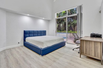 Light & open, this lovely 2-story home of 3 bedrooms & 2 1/2 on Woodfield Country Club in Florida - for sale on GolfHomes.com, golf home, golf lot