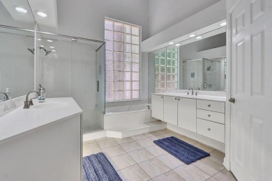 Light & open, this lovely 2-story home of 3 bedrooms & 2 1/2 on Woodfield Country Club in Florida - for sale on GolfHomes.com, golf home, golf lot